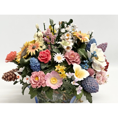 582 - A Bradford Exchange “States Flower Bouquet” first issued in the Thomas Kinkade All American Bouquet.... 