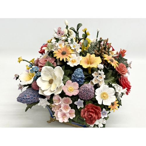 582 - A Bradford Exchange “States Flower Bouquet” first issued in the Thomas Kinkade All American Bouquet.... 