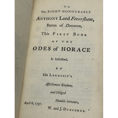 412 - A collection of 18th and Early 19th Century leather bound books. Including The Works of Horace.