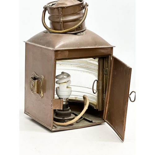 813 - An Early 20th Century copper ships lantern. 26x21x34cm