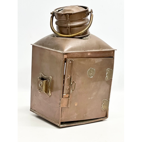 813 - An Early 20th Century copper ships lantern. 26x21x34cm