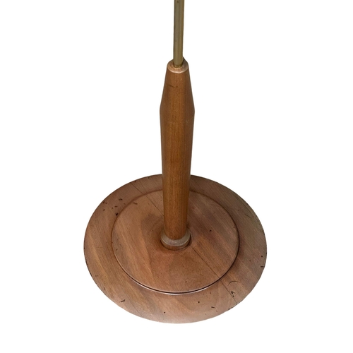 148 - A Mid Century teak standard lamp. 176.5cm.