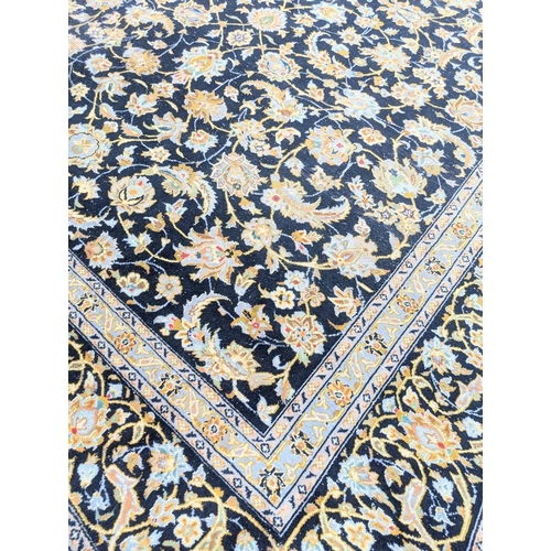 272 - A very large good quality Iranian hand made carpet/rug. 358x275cm