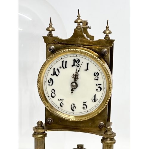 818 - Gustav Becker. A brass anniversary clock. 19x31cm