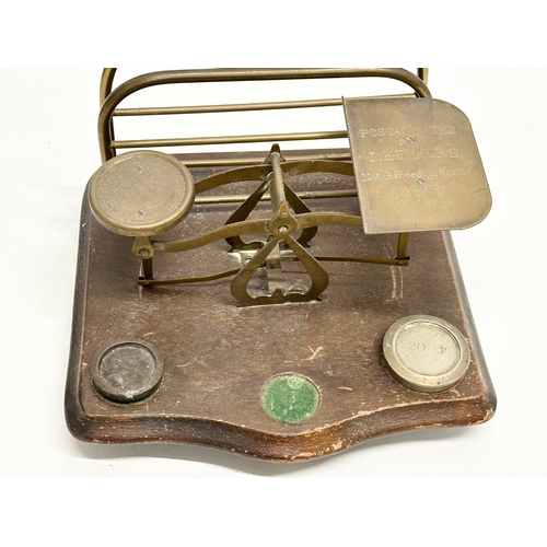 822 - 2 Late 19th Century postal scales. A postal scale with letter rack 21x20x18cm