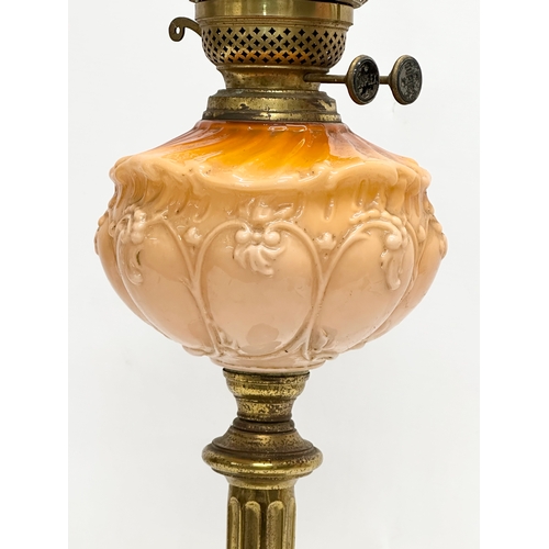 805 - A 19th Century Victorian opaline glass double burner oil lamp/converted table lamp, with brass colum... 