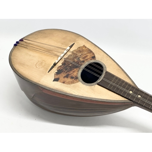 790 - Giuseppe Puglisi Reale & Figli. An Early 20th Century mandolin with case.