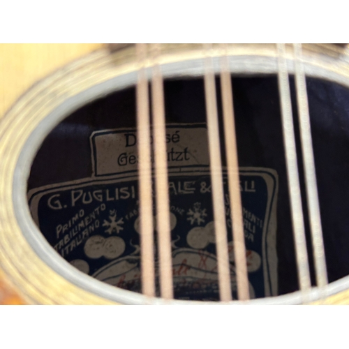 790 - Giuseppe Puglisi Reale & Figli. An Early 20th Century mandolin with case.