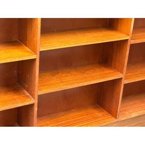 139 - A large Mid Century teak open bookcase. 183x23x94.5cm. (5)