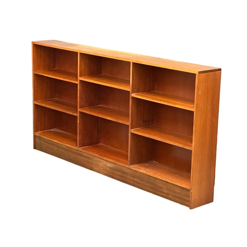 139 - A large Mid Century teak open bookcase. 183x23x94.5cm. (5)