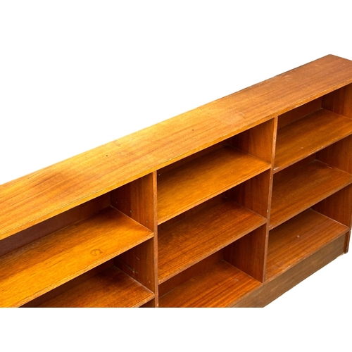 139 - A large Mid Century teak open bookcase. 183x23x94.5cm. (5)