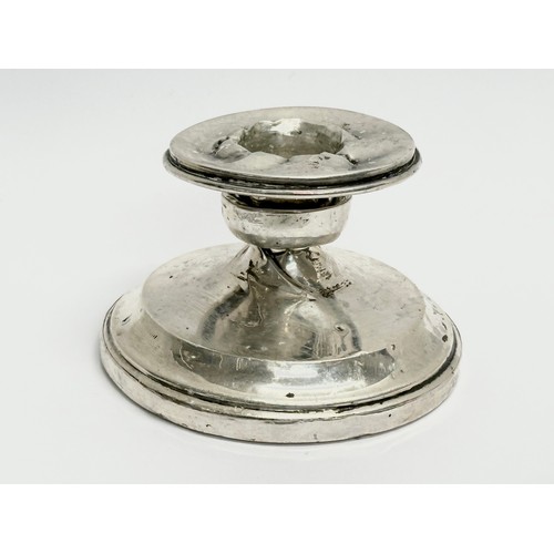 685 - A Sterling silver candlestick, 7.5cm x 5cm