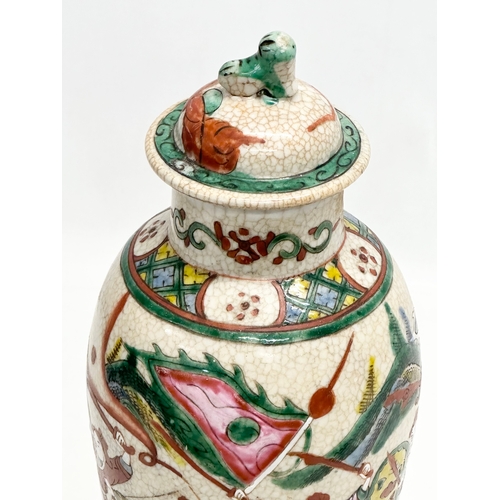 305 - A Late 19th Century Chinese crackle glazed pot with cover. With 4 character mark. 36cm