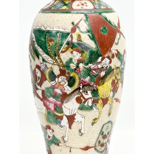 305 - A Late 19th Century Chinese crackle glazed pot with cover. With 4 character mark. 36cm