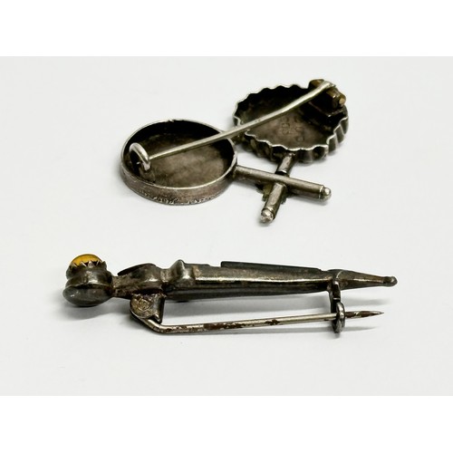 712C - 2 silver brooches. Birmingham, 1900 & Sterling mark. Scottish dirk brooch.  (5)