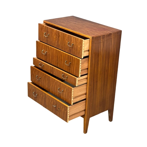 332 - A 1960’s Mid Century tola wood chest of drawers. 76x43x107.5cm(4)