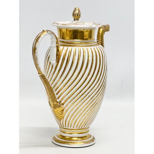 9 - Paris Porcelain. A large Early 19th Century French Empire gilt coffee pot. Circa 1810-1830. 23x28cm