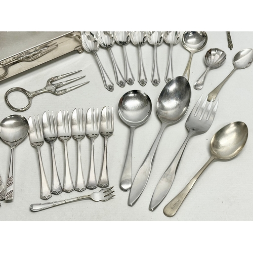 840 - A collection of silver plate and stainless steel. E.P and stainless cutlery. House of Marbles wine b... 