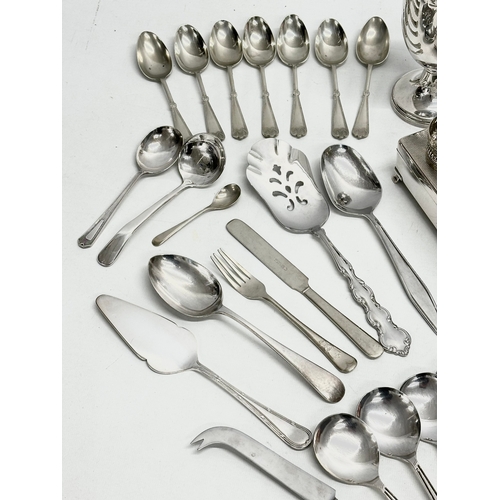 840 - A collection of silver plate and stainless steel. E.P and stainless cutlery. House of Marbles wine b... 