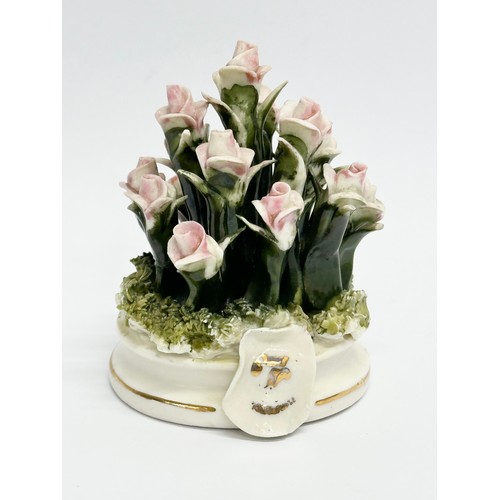 841 - A collection of silver plated cutlery and an Capodimonte miniature flower basket. Including vintage ... 