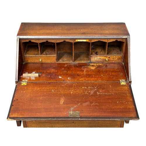 920 - A Late 19th Century Sheraton revival inlaid mahogany writing bureau. 77x43x97cm(8)