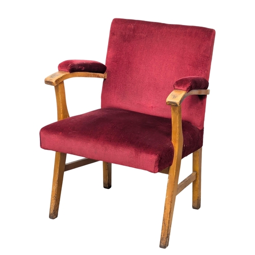 927 - A set of 4 1950s oak framed armchairs with velvet upholstery. (4)