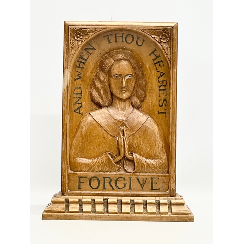 402 - A 1940’s religious table plaque. And When Thou Hearst Forgive. 28x9x37cm