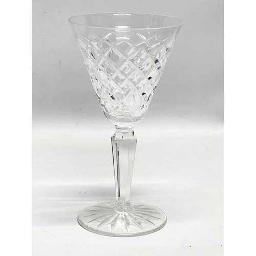 419 - A set of 7 Waterford Crystal “Tyrone” wine glasses. 9x16.5cm.