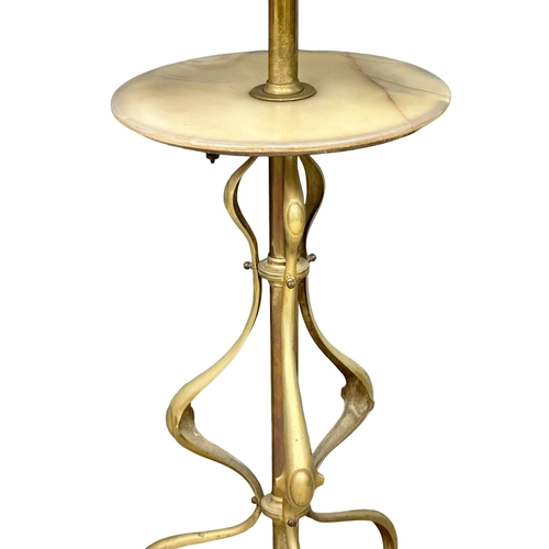 118 - An Early 20th Century brass and onyx standard lamp 145cm