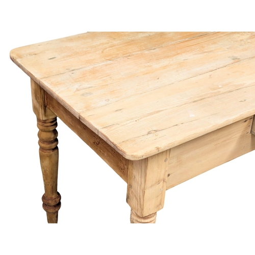 120 - A 19th Century Victorian pine farmhouse kitchen table with drawer on turned legs. 135x64x76cm