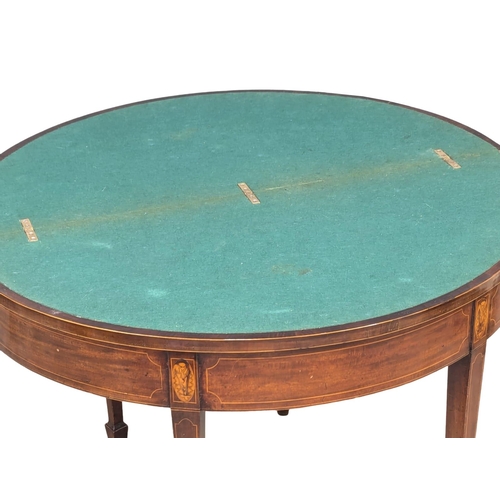 165 - A George III Sheraton style inlaid mahogany turnover games table. Circa 1800s. 96x46x75cm