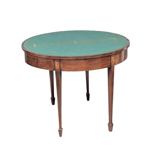 165 - A George III Sheraton style inlaid mahogany turnover games table. Circa 1800s. 96x46x75cm