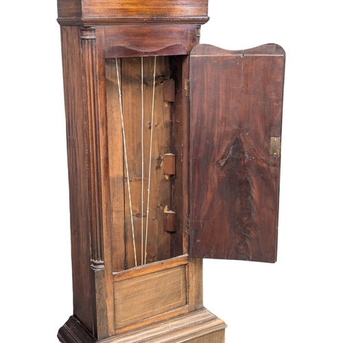 167 - A Late George III mahogany long case clock with painted dial on bracket feet. With weights and pendu... 