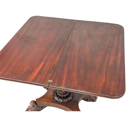 186 - A William IV mahogany turnover tea table on lion paw feet. Circa 1830. 91.5x43.5x74.5cm