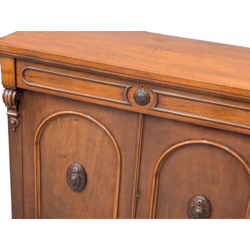 318 - An Early Victorian mahogany 2 door side cabinet with drawer. 122x50.5x102cm