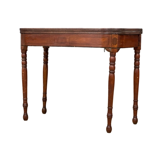 536 - A George IV inlaid mahogany turnover tea table. Circa 1820. 92x46x76cm