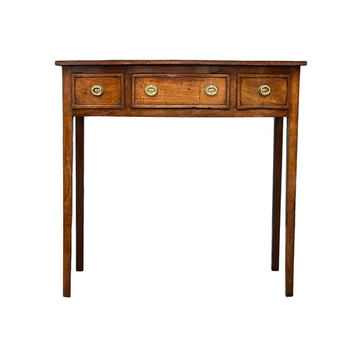 57 - A Late 18th Century George III mahogany bow front writing table with leather top on square tapering ... 