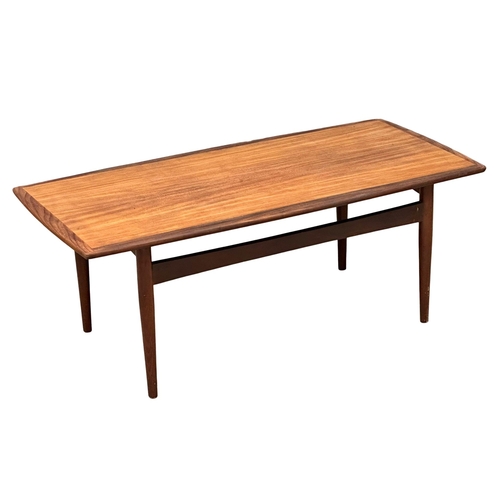 66 - A good quality 1960’s Mid Century teak coffee table. 118x56x44cm