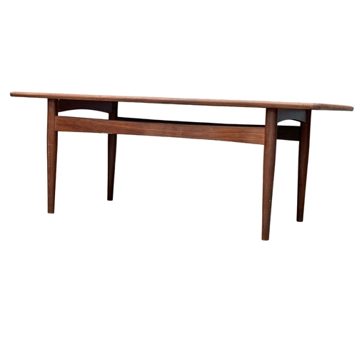 66 - A good quality 1960’s Mid Century teak coffee table. 118x56x44cm