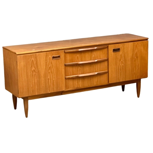 67 - A Mid Century teak sideboard. Greaves & Thomas style. 1960’s. 176x49x78cm.