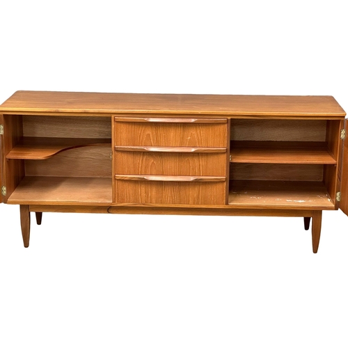 67 - A Mid Century teak sideboard. Greaves & Thomas style. 1960’s. 176x49x78cm.