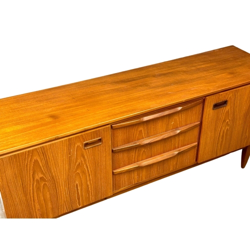 67 - A Mid Century teak sideboard. Greaves & Thomas style. 1960’s. 176x49x78cm.