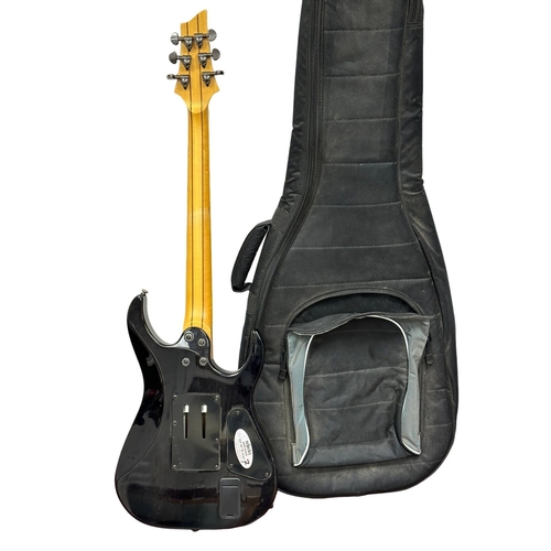 781 - A 2013 Schecter Diamond Series electric guitar. With a case.