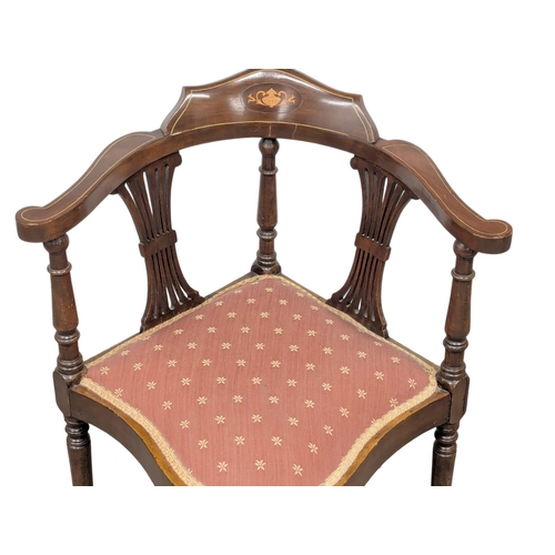 836 - An Edwardian inlaid mahogany corner chair