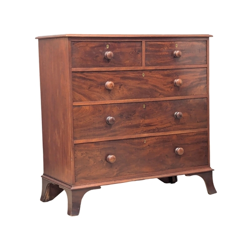 97 - A 19th Century Victorian mahogany chest of drawers with bun handles on splayed feet. 110x51x113cm