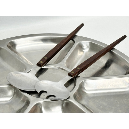 146 - A large Danish Mid Century stainless steel food server and teak handled utensils. 37x5cm