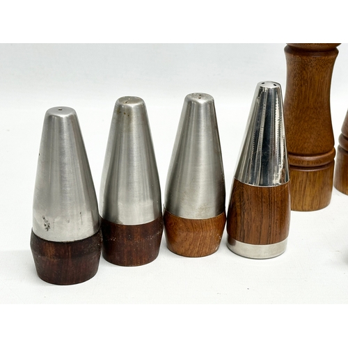 147A - A quantity of Danish Mid Century tableware. Danish egg holders, salt and pepper shakers, toast rack,... 