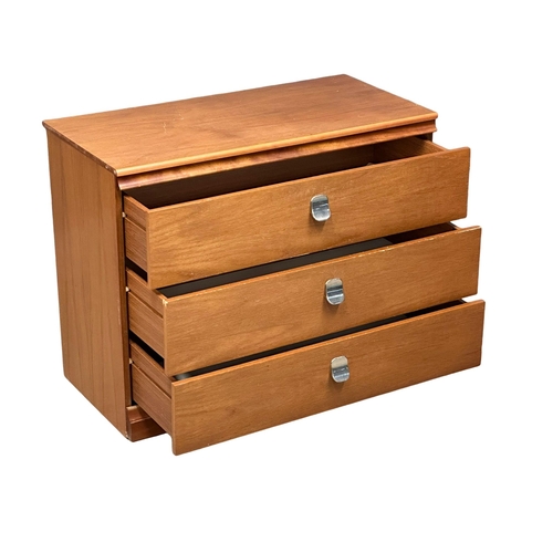 261 - A Mid Century teak chest of drawers. Meredew Avalon. 84.5x42x66.5cm.