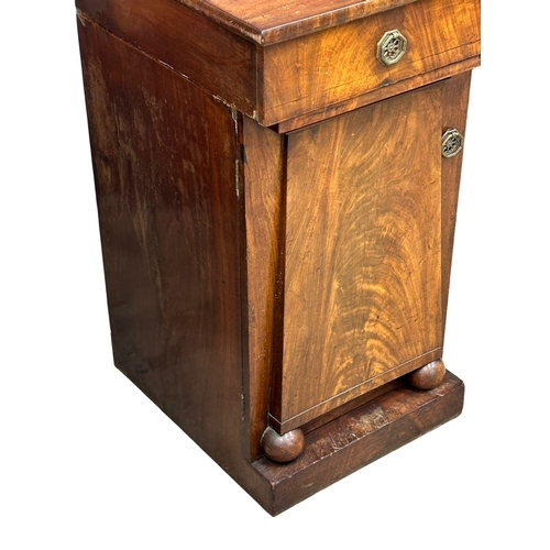 399 - A William IV mahogany pedestal sideboard. With Prince of Wales Feathers. Circa 1830. 198x64x134cm.