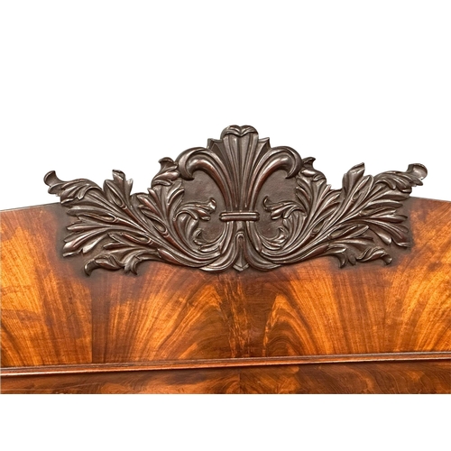 399 - A William IV mahogany pedestal sideboard. With Prince of Wales Feathers. Circa 1830. 198x64x134cm.